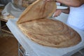 A stack of arabic bread called Markook in lebanon, juste after being cooked on a convex iron plate. Royalty Free Stock Photo