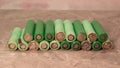 Close-up of a stack of green lithium-ion batteries arranged on a surface Royalty Free Stock Photo