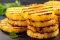 close-up of a stack of grilled pineapple slices