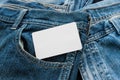 Close up Stack of jeans and white card Royalty Free Stock Photo