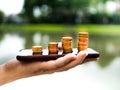 Close up stack of money coins on the mobile phone, business in eCommerce concept Royalty Free Stock Photo