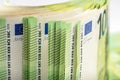 Close-up of a stack of paper bills, side view. Euro banknotes stacked on top of each other. Big pile of money. Royalty Free Stock Photo