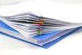 Stack of papers files piles of unfinished documents achieves with paper clips Royalty Free Stock Photo