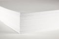 Close up of stack of papers on white background. Office: Pile of Paper Royalty Free Stock Photo