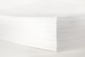 Close up of stack of papers on white background. Office: Pile of Paper Royalty Free Stock Photo