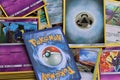 Close up of a stack of Pokemon cards.