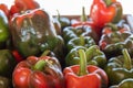 Close up of a Stack of Red and Green Bell Peppers Royalty Free Stock Photo