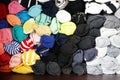 Close up of stack of rolled colorful clothes