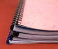 Close-up of a stack of spiral notebooks / reports Royalty Free Stock Photo