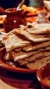 Close up of a Stack of Warm Flatbreads on a Rustic Dish Royalty Free Stock Photo