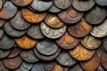 Close-up of a Stack of Weathered Coins with a Shiny Copper Tone Royalty Free Stock Photo