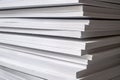 Close up of stack of white extruded polystyrene sheets insulative material for buildings