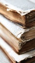 Close up of a stack of worn antique books with aged pages Royalty Free Stock Photo
