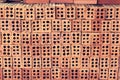 Close up of stacked clay bricks - constructional material - industrial production of bricks