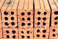 Close up of stacked clay bricks - constructional material - industrial production of bricks Royalty Free Stock Photo