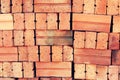 Close up of stacked clay bricks - constructional material - industrial production of bricks Royalty Free Stock Photo