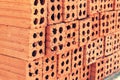 Close up of stacked clay bricks - constructional material - industrial production of bricks Royalty Free Stock Photo