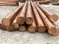 Close-up of stacked copper rods in a warehouse Royalty Free Stock Photo