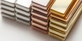 Close up of stacked gold, copper, and silver bars Royalty Free Stock Photo