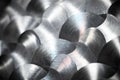 Close-up of stacked metallic discs with concentric circular patterns Royalty Free Stock Photo