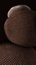 Close-up of stacked textile-covered spheres with detailed woven surface texture Royalty Free Stock Photo
