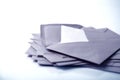 close up Stacking of envelopes and mail letter paper on white b