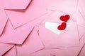 close up Stacking of pink envelopes and mail letter paper and re