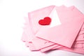close up Stacking of pink envelopes and mail letter paper and th