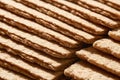 Close-up of stacks of many crispbread. Macro shot Royalty Free Stock Photo