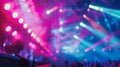 Close up of a stage with bright lights and a crowd Royalty Free Stock Photo