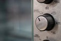 Close Up of stainless steel oven temperature control knob Royalty Free Stock Photo