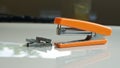 Close up of the stapler on the table, outdoors