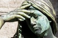 Close up on a statue of a praying woman Royalty Free Stock Photo