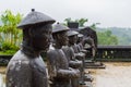 Close-up of statues of warriors in a line in Imperial Khai Dinh Tomb located in Hue, Vietnam, December 16, 2016 Royalty Free Stock Photo