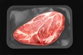 Close up of steak, on pack, isolated on black background.