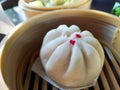 Close-up steam chinese pork bun in wooden container sold in Thailand Royalty Free Stock Photo