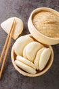 Close up Steamed Bao Buns leaf on bamboo basket. Vertical top view Royalty Free Stock Photo