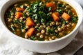 Close-up of a steaming bowl of lentil soup, garnished with fresh parsley and a swirl of cream. AI generated. Royalty Free Stock Photo