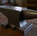 Close up of steel anvil lying on table in workshop