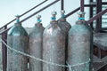 Close-up of steel cylinders with compressed gas - argon, carbon dioxide or oxygen for welding, outdoors