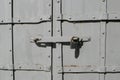 a close up of a steel door with a padlock Royalty Free Stock Photo