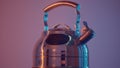 Close up of a steel polished kettle with whistle for the gas stove. Action. Metal teapot isolated against the wall under Royalty Free Stock Photo