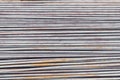 Close up steel rebar for building texture in the construction site. Rebar is an important building material. Rusty iron bars at th Royalty Free Stock Photo