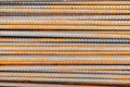 Close up steel rebar for building texture in the construction site. Rebar is an important building material. Rusty iron bars at th