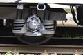 Close up of steel train wheel on rail track Royalty Free Stock Photo