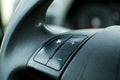 Close up steering wheel in modern car.