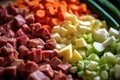 close-up of stew ingredients: chopped vegetables and meat