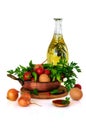 Close-up still life with mixed vegetables in frypan, eggs and olive oil isolated on white background Royalty Free Stock Photo