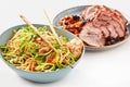 Vegetarian Asian Noodle Dish and Roast Pork Royalty Free Stock Photo