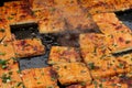 Close up Stinky tofu on frying pan